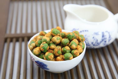 完全菜食主義者のHot&Spicyの卸し売り味は上塗を施してあるグリーンピースのシャキッとした軽食を揚げた