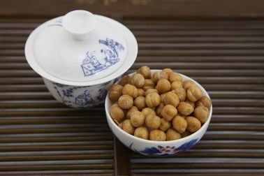 低脂肪のWasabiによって焼かれるひよこ豆の軽食、歯応えが良い焼かれたひよこ豆の堅い質